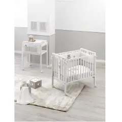 CHARLY MINI WHITE ERBESI CRIB WITH GRAY UPHOLSTERY AND APPLIQUE